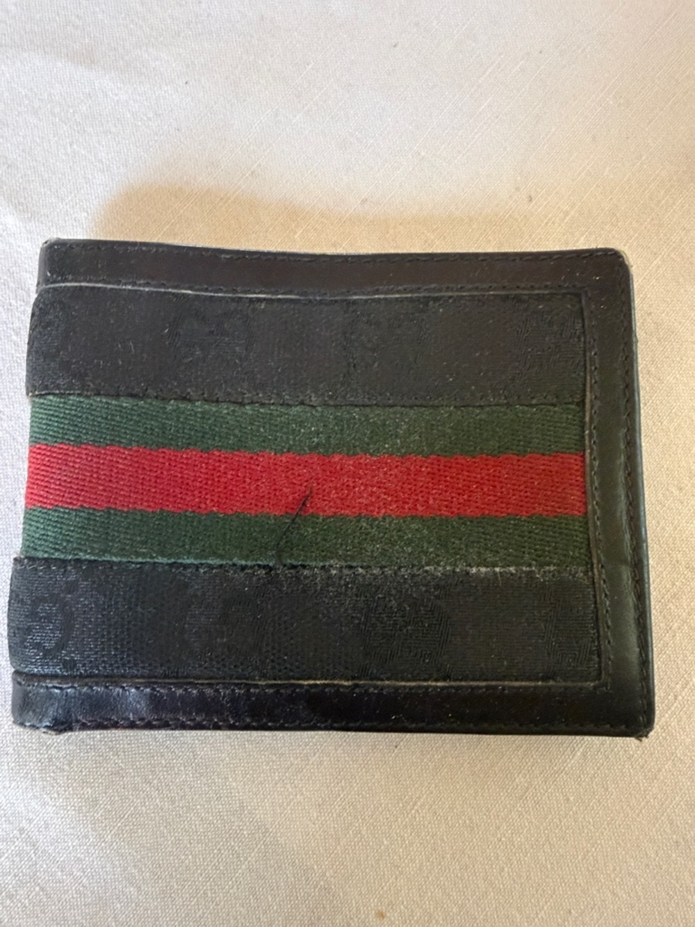 Vintage GUCCI canvas and leather billfold/wallet.